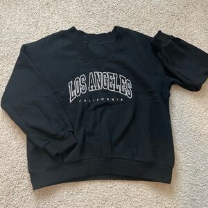 Black V-neck sweatshirt